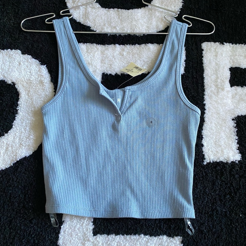 blue ripped tank top